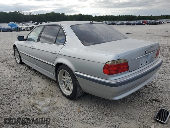 2001 BMW 7 Series 740iL with VIN WBAGH834X1DP26587, listed as a Copart auction lot 71174574 with 0 mi miles and Salvage Title. Bid and sale history available at carsss.com. Image 2.