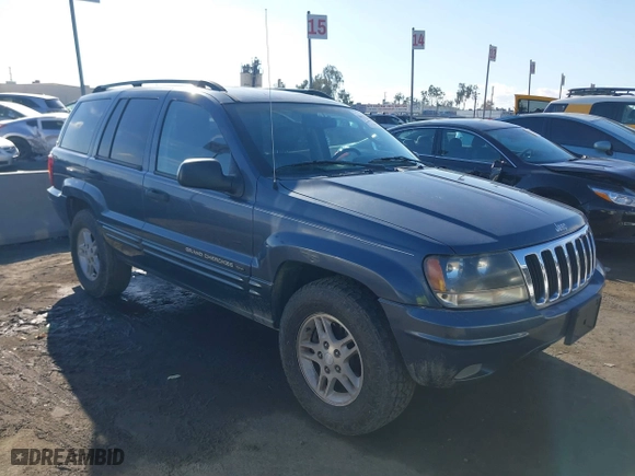 2002 Jeep Grand Cherokee Laredo with VIN 1J4GW48N72C261741, listed as a IAAI auction lot 40972222 with 174,516 mi miles. Bid and sale history available at carsss.com. Image 1.