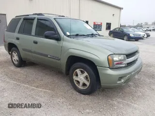 2004 Chevrolet TrailBlazer LT with VIN 1GNDS13S042389058, listed as a IAAI auction lot 41897018 with 141,587 mi miles and . Bid and sale history available at DreamBid. Image 1.