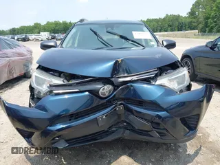 2017 Toyota RAV4 LE with VIN JTMBFREV5HJ173180, listed as a IAAI auction lot 42402753 with 97,917 mi miles and . Bid and sale history available at DreamBid. Image 12.