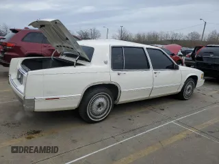 1990 Cadillac Fleetwood z VIN 1G6CB5332L4248633, wystawiony jako Copart lot #44218444 z przebiegiem 40 635 mil mil oraz Nie do naprawy. Historia ofert i sprzedaży dostępna na DreamBid. Obrazek 3.