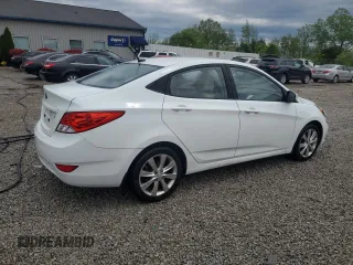 2012 Hyundai Accent GLS z VIN KMHCU4AE9CU243155, wystawiony jako Copart lot #53612565 z przebiegiem 97 636 mil mil oraz Nie do naprawy. Historia ofert i sprzedaży dostępna na DreamBid. Obrazek 3.