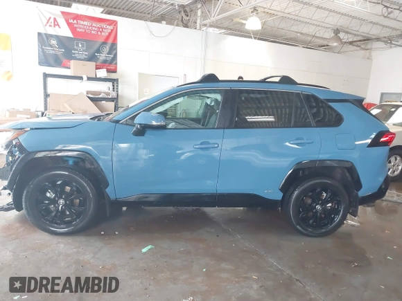 2022 Toyota RAV4 Hybrid SE with VIN 4T3T6RFV3NU089343, listed as a IAAI auction lot 41223554 with 50,589 mi miles and . Bid and sale history available at DreamBid. Image 14.