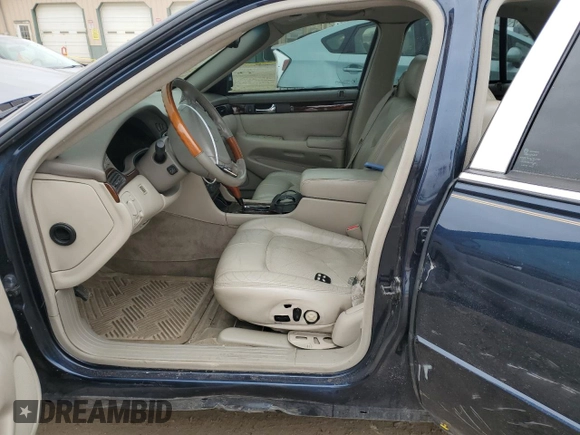 2002 Cadillac Seville Touring STS z VIN 1G6KY54932U174599, wystawiony jako Copart lot #44996845 z przebiegiem 168 819 mil mil oraz Szkoda całkowita • Salvage title. Historia ofert i sprzedaży dostępna na DreamBid. Obrazek 7.
