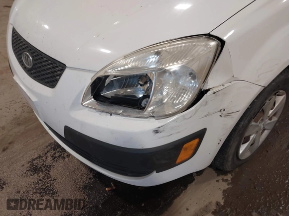 2009 Kia Rio SX with VIN KNADE223896533839, listed as a IAAI auction lot 41328220 with 140,968 mi miles. Bid and sale history available at carsss.com. Image 6.