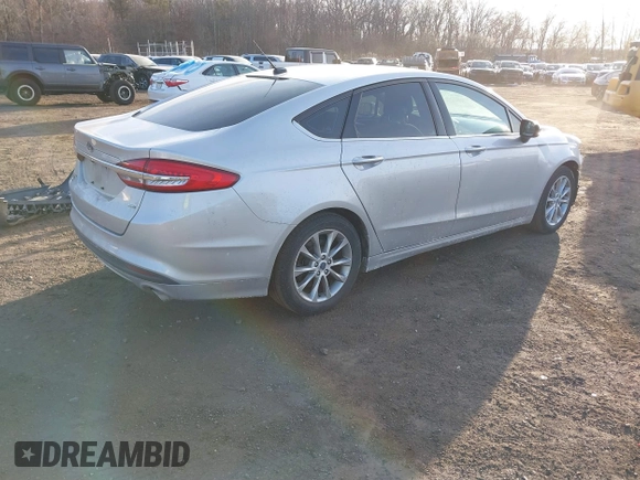 2017 Ford Fusion SE with VIN 3FA6P0H75HR125097, listed as a IAAI auction lot 41441229 with 112,160 mi miles. Bid and sale history available at carsss.com. Image 4.