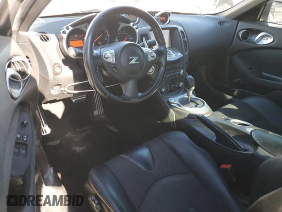 2014 Nissan 370Z Touring with VIN JN1AZ4EH1EM635411, listed as a Copart auction lot 82670344 with 77,501 mi miles and Salvage Title. Bid and sale history available at carsss.com. Image 8.