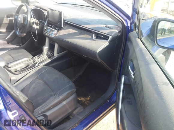 2022 Toyota Corolla Cross XLE with VIN 7MUDAAAG7NV024323, listed as a IAAI auction lot 42643048 with 76,465 mi miles and . Bid and sale history available at DreamBid. Image 5.