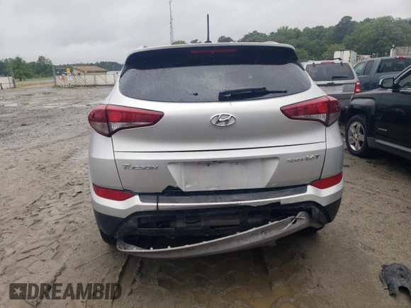 2017 Hyundai Tucson Sport with VIN KM8J33A23HU355807, listed as a Copart auction lot 58431795 with 127,353 mi miles and Salvage title. Bid and sale history available at DreamBid. Image 6.