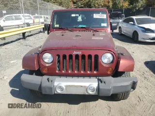 2010 Jeep Wrangler Sahara с VIN 1J4GA5D16AL225139, выставлен на аукционе Copart как лот 77114204 с пробегом Не указан миль и Списание • Salvage title. История ставок и продаж доступна на DreamBid. Изображение 5.