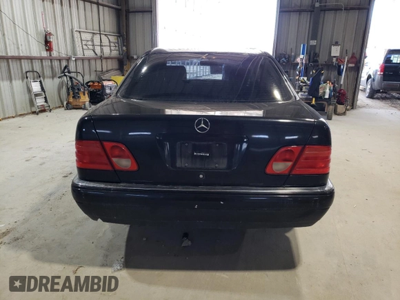 1998 Mercedes-Benz E-Class with VIN WDBJF65FXWA648112, listed as a Copart auction lot 47074665 with 0 mi miles and Salvage Title. Bid and sale history available at carsss.com. Image 6.
