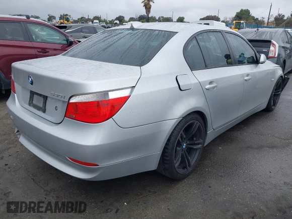 2007 BMW 5 Series 530i with VIN WBANE73507CM46579, listed as a IAAI auction lot 41511577 with 168,904 mi miles. Bid and sale history available at carsss.com. Image 4.