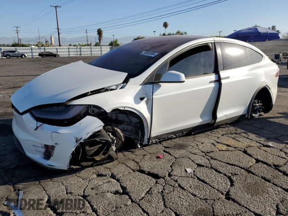 2021 Tesla Model X Long Range Plus with VIN 5YJXCBE22MF311576, listed as a Copart auction lot 68583984 with 83,137 mi miles and Salvage Title. Bid and sale history available at carsss.com. Image 1.