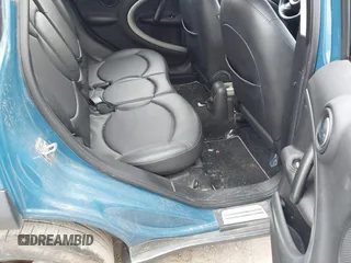 2012 MINI Countryman with VIN WMWZB3C59CWM06836, listed as a IAAI auction lot 41690459 with 172,163 mi miles and . Bid and sale history available at DreamBid. Image 8.