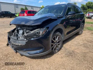 2018 Mazda CX-5 Grand Touring with VIN JM3KFBDMXJ1391984, listed as a Copart auction lot 65138665 with 97,244 mi miles and Clean title. Bid and sale history available at DreamBid. Image 2.