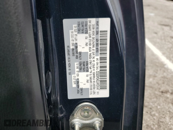 2021 Mazda MX-5 Miata Grand Touring with VIN JM1NDAM70M0460532, listed as a Copart auction lot 58828045 with 70,269 mi miles and Salvage title. Bid and sale history available at DreamBid. Image 12.