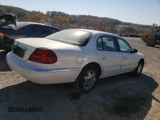 2002 Lincoln Continental with VIN 1LNHM97V62Y643532, listed as a Copart auction lot 76015984 with 154,374 mi miles and Salvage Title. Bid and sale history available at carsss.com. Image 3.