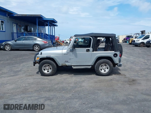 2004 Jeep Wrangler Sport with VIN 1J4FA49S04P781581, listed as a IAAI auction lot 42078693 with 111,123 mi miles and . Bid and sale history available at DreamBid. Image 14.
