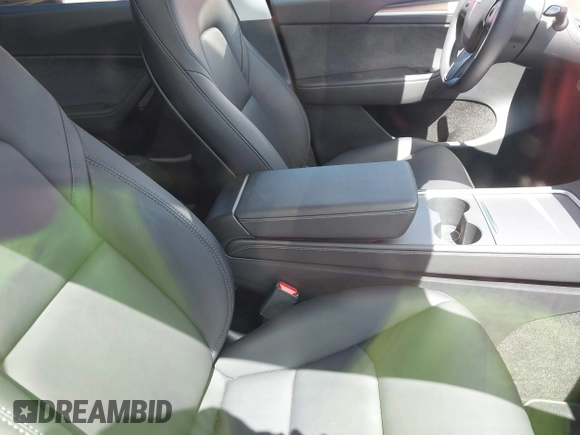 2024 Tesla Model Y Long Range with VIN 7SAYGAEE4RF078906, listed as a IAAI auction lot 42051207 with Not Provided miles and . Bid and sale history available at DreamBid. Image 5.