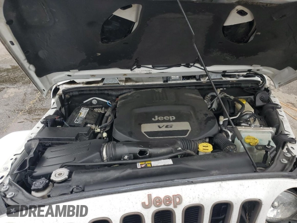 2016 Jeep Wrangler Sahara z VIN 1C4AJWBG3GL286692, wystawiony jako Copart lot #51988555 z przebiegiem 109 764 mil mil oraz Szkoda całkowita • Salvage title. Historia ofert i sprzedaży dostępna na DreamBid. Obrazek 12.