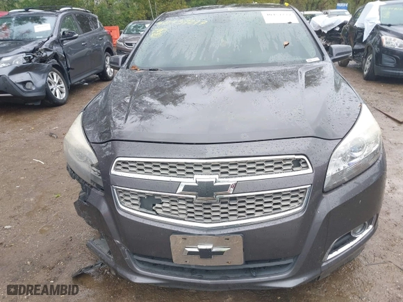 2013 Chevrolet Malibu LTZ with VIN 1G11H5SA1DF286288, listed as a IAAI auction lot 40457277 with 216,703 mi miles. Bid and sale history available at carsss.com. Image 12.