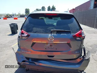 2017 Nissan Rogue SV with VIN KNMAT2MT9HP588530, listed as a IAAI auction lot 42560615 with 87,265 mi miles and . Bid and sale history available at DreamBid. Image 16.