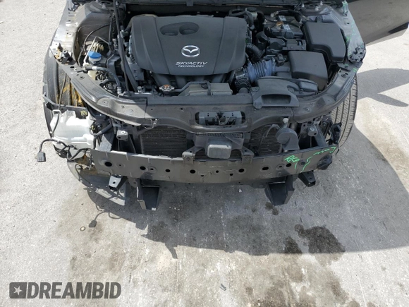 2015 Mazda 3 S Grand Touring with VIN JM1BM1W37F1237706, listed as a Copart auction lot 52785545 with 112,657 mi miles and Salvage Title. Bid and sale history available at DreamBid. Image 11.