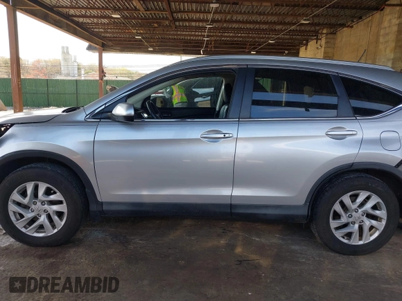 2015 Honda CR-V EX-L with VIN 2HKRM4H72FH616198, listed as a IAAI auction lot 42038752 with 82,826 mi miles and . Bid and sale history available at carsss.com. Image 13.