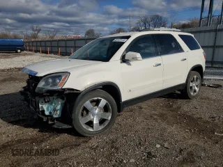 2010 GMC Acadia SLT1 z VIN 1GKLRMED8AJ136057, wystawiony jako Copart lot #52137115 z przebiegiem 145 892 mil mil oraz Szkody całkowita. Historia ofert i sprzedaży dostępna na DreamBid. Obrazek 1.