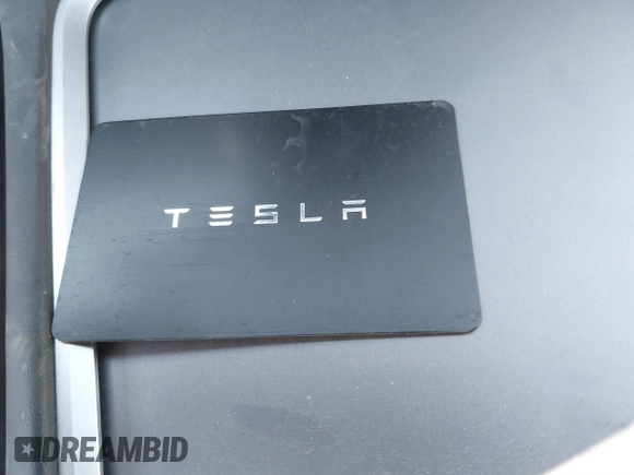 2021 Tesla Model Y Performance with VIN 5YJYGDEF8MF246658, listed as a IAAI auction lot 41679793 with 28,015 mi miles and . Bid and sale history available at DreamBid. Image 11.