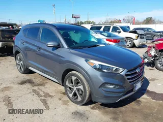 2017 Hyundai Tucson Sport z VIN KM8J33A27HU561356, wystawiony jako IAAI lot #41386820 z przebiegiem 101 104 mil mil oraz . Historia ofert i sprzedaży dostępna na DreamBid. Obrazek 1.