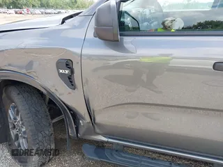 2024 Ford Ranger XLT z VIN 1FTER4HH3RLE16911, wystawiony jako IAAI lot #42596544 z przebiegiem 16 657 mil mil oraz . Historia ofert i sprzedaży dostępna na DreamBid. Obrazek 19.