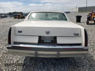 1996 Cadillac Fleetwood z VIN 1G6DW52P1TR715038, wystawiony jako Copart lot #69987194 z przebiegiem Nie podano mil oraz Szkody całkowita. Historia ofert i sprzedaży dostępna na DreamBid. Obrazek 6.