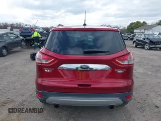 2016 Ford Escape Titanium with VIN 1FMCU9JX2GUA89716, listed as a IAAI auction lot 41899786 with 85,474 mi miles and . Bid and sale history available at DreamBid. Image 16.