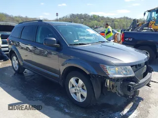 2014 Dodge Journey SE with VIN 3C4PDCAB7ET136799, listed as a IAAI auction lot 41972348 with 163,357 mi miles. Bid and sale history available at carsss.com. Image 1.