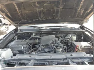 2018 Toyota Tacoma SR with VIN 5TFAX5GN5JX126118, listed as a IAAI auction lot 41949791 with 37,615 mi miles and . Bid and sale history available at DreamBid. Image 10.