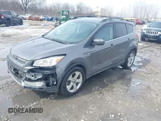 2014 Ford Escape SE with VIN 1FMCU9GX0EUA37649, listed as a IAAI auction lot 41834356 with 189,953 mi miles. Bid and sale history available at carsss.com. Image 2.