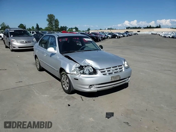 2005 Hyundai Accent GLS with VIN KMHCG45C55U623340, listed as a Copart auction lot 59587304 with 275,364 mi miles and Salvage Title. Bid and sale history available at carsss.com. Image 10.