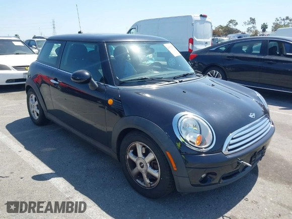 2008 MINI Hardtop with VIN WMWMF33538TT64168, listed as a IAAI auction lot 41976279 with 115,039 mi miles and . Bid and sale history available at DreamBid. Image 1.