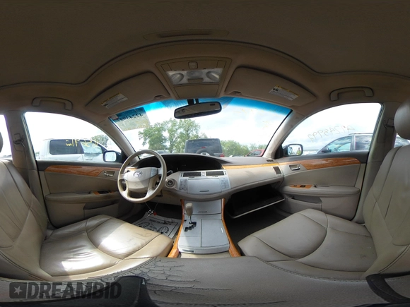 2007 Toyota Avalon XL z VIN 4T1BK36B87U184714, wystawiony jako IAAI lot #42243997 z przebiegiem 165 691 mil mil oraz . Historia ofert i sprzedaży dostępna na DreamBid. Obrazek 19.