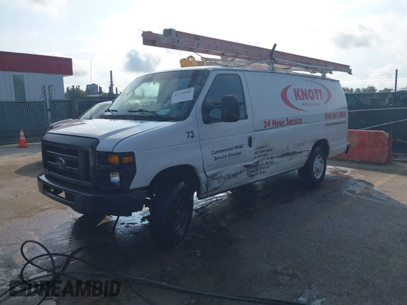2014 Ford Econoline Cargo Commercial with VIN 1FTNS2EW7EDA04202, listed as a IAAI auction lot 42720940 with 167,356 mi miles and . Bid and sale history available at DreamBid. Image 17.