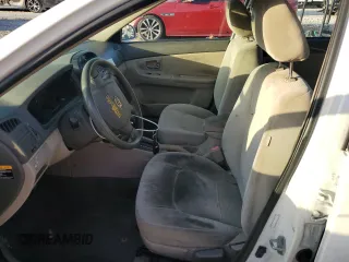 2009 Kia Spectra EX with VIN KNAFE221195630944, listed as a Copart auction lot 42291345 with 83,269 mi miles and Salvage Title. Bid and sale history available at DreamBid. Image 7.