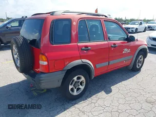 2003 Chevrolet Tracker ZR2 z VIN 2CNBJ734736914220, wystawiony jako IAAI lot #42351611 z przebiegiem 190 578 mil mil oraz . Historia ofert i sprzedaży dostępna na DreamBid. Obrazek 4.