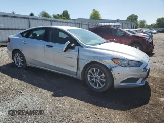 2017 Ford Fusion Hybrid SE with VIN 3FA6P0LU4HR270743, listed as a Copart auction lot 58542505 with 70,837 mi miles and Salvage title. Bid and sale history available at DreamBid. Image 4.