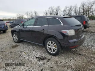 2011 Mazda CX-7 S Touring z VIN JM3ER4CL4B0371150, wystawiony jako Copart lot #52794945 z przebiegiem 147 856 mil mil oraz Czysty tytuł • Clean title. Historia ofert i sprzedaży dostępna na DreamBid. Obrazek 2.
