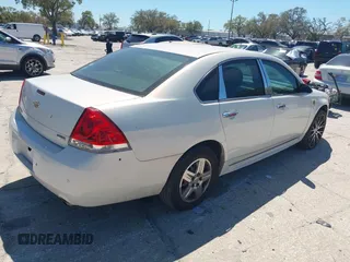 2013 Chevrolet Impala Police with VIN 2G1WD5E34D1227693, listed as a IAAI auction lot 41613853 with 163,891 mi miles. Bid and sale history available at carsss.com. Image 4.