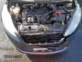 2012 Ford Fiesta SE z VIN 3FADP4EJ4CM183237, wystawiony jako Copart lot #48825605 z przebiegiem 92 798 mil mil oraz Szkoda całkowita • Salvage title. Historia ofert i sprzedaży dostępna na DreamBid. Obrazek 11.