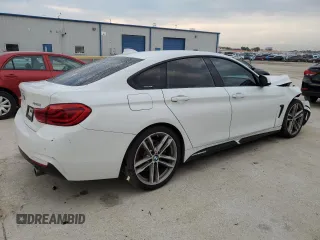 2018 BMW 4 Series 440i with VIN WBA4J5C51JBF06736, listed as a Copart auction lot 64165524 with 65,066 mi miles and Salvage Title. Bid and sale history available at DreamBid. Image 3.