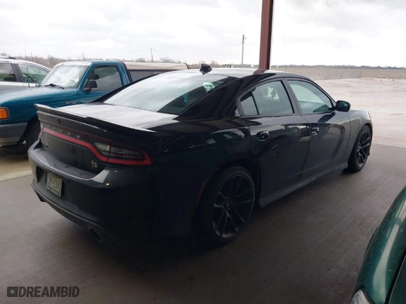 2021 Dodge Charger Scat Pack Widebody with VIN 2C3CDXGJ4MH520751, listed as a IAAI auction lot 41526166 with 85,014 mi miles. Bid and sale history available at carsss.com. Image 4.