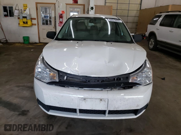 2009 Ford Focus SE with VIN 1FAHP35N19W146251, listed as a Copart auction lot 68979994 with 58,315 mi miles and Salvage Title. Bid and sale history available at carsss.com. Image 5.
